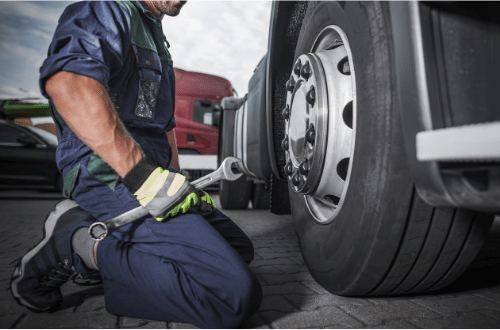 Truck tire repair performed on a big rig
