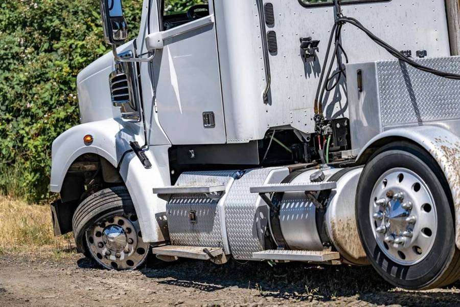 Truck tire repair needed for a transport truck
